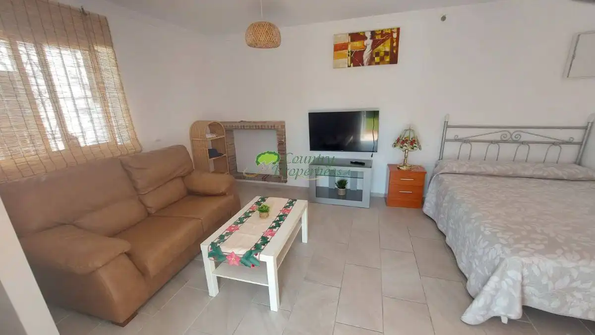 Sala d'estar de Finca rústica de lloguer en Algarrobo amb Terrassa, Traster i Moblat