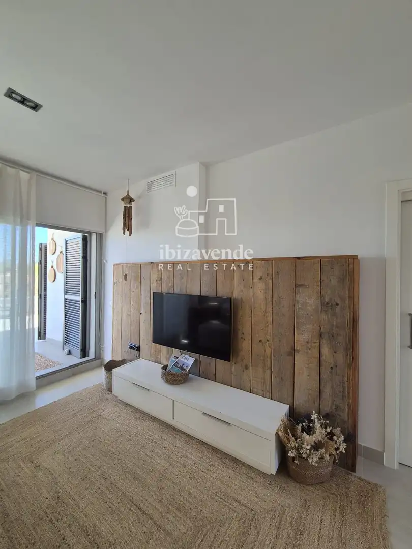Sala d'estar de Àtic de lloguer en Sant Josep de sa Talaia amb Aire condicionat, Terrassa i Piscina