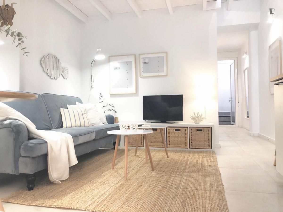 Sala d'estar de Apartament de lloguer en  Valencia Capital amb Aire condicionat, Moblat i Forn