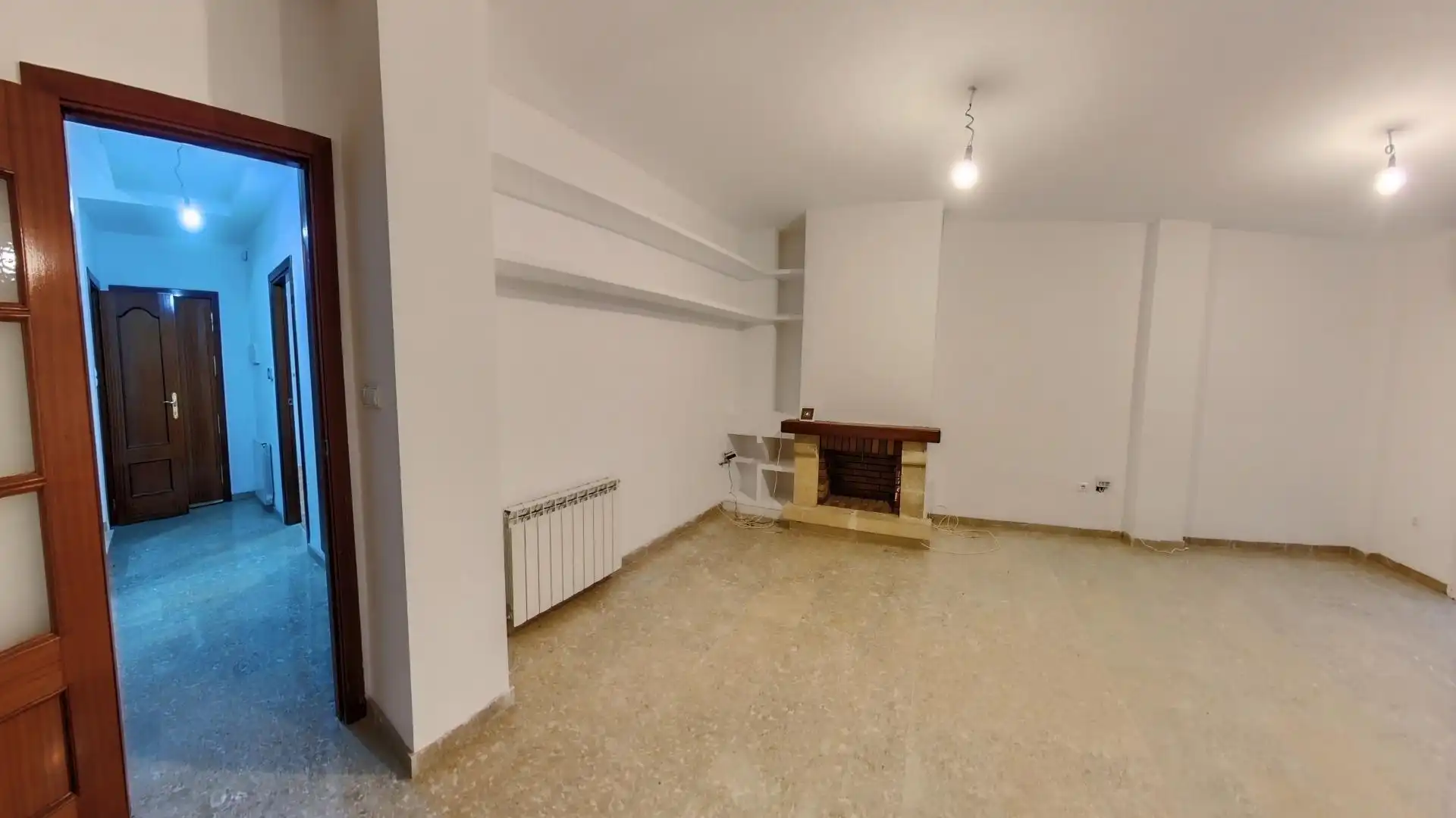 Sala de estar de Casa adosada en venta en Huétor Vega con Calefacción, Jardín privado y Piscina
