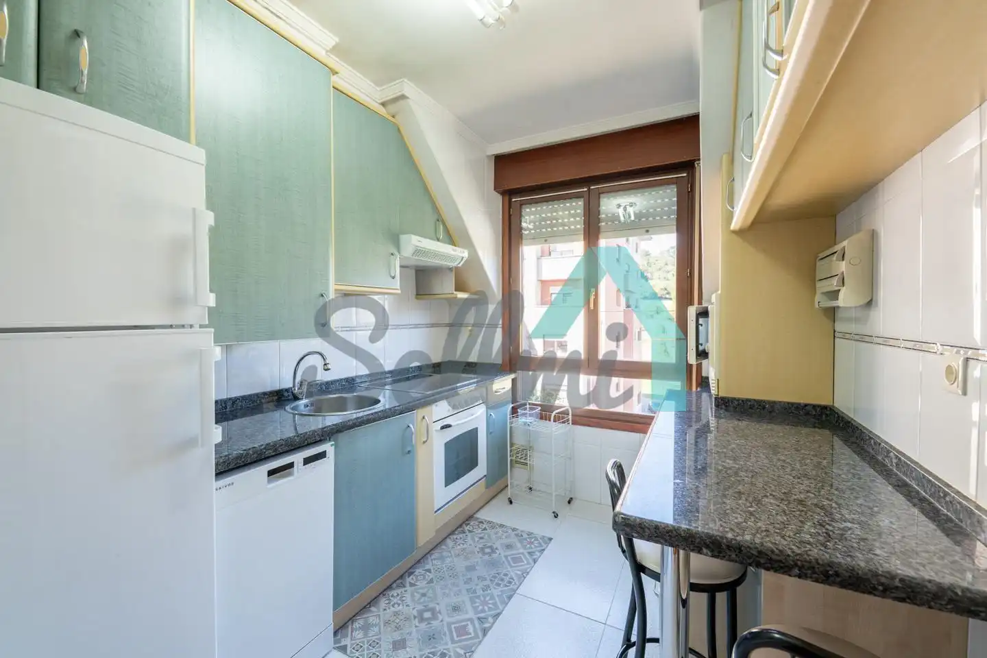 Kitchen of Flat for sale in Oviedo   with Heating, Parquet flooring and Storage room