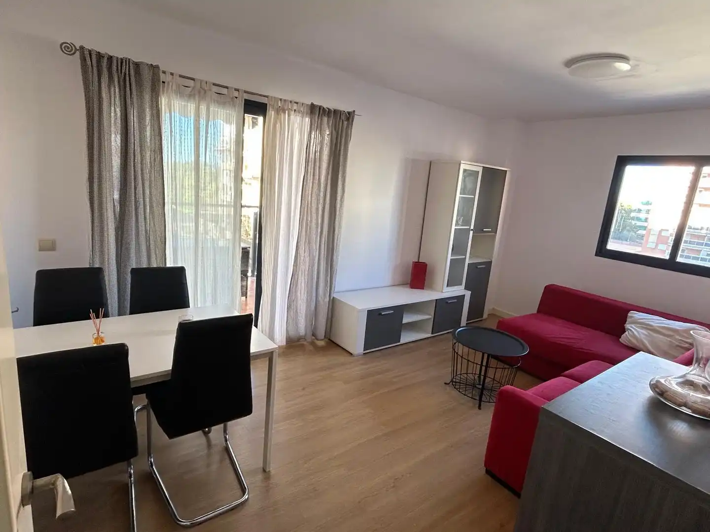 Sala de estar de Apartamento de alquiler con opción a compra en La Pobla de Farnals con Aire acondicionado, Jardín privado y Trastero
