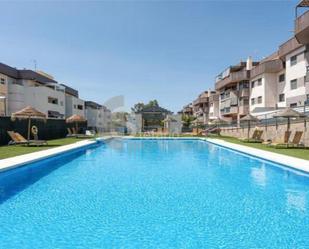 Swimming pool of Planta baja for sale in Málaga Capital  with Air Conditioner, Private garden and Parquet flooring