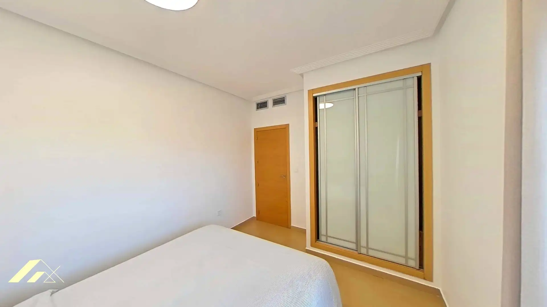 Dormitori de Apartament en venda en Orihuela Costa
