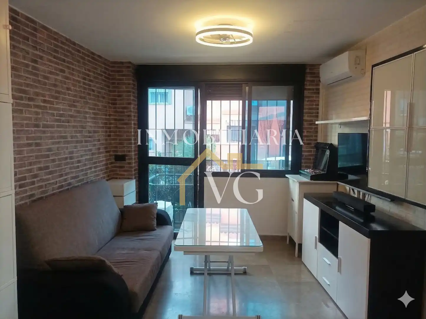 Sala de estar de Apartamento en venta en Guillena con Aire acondicionado, Piscina y Piscina comunitaria