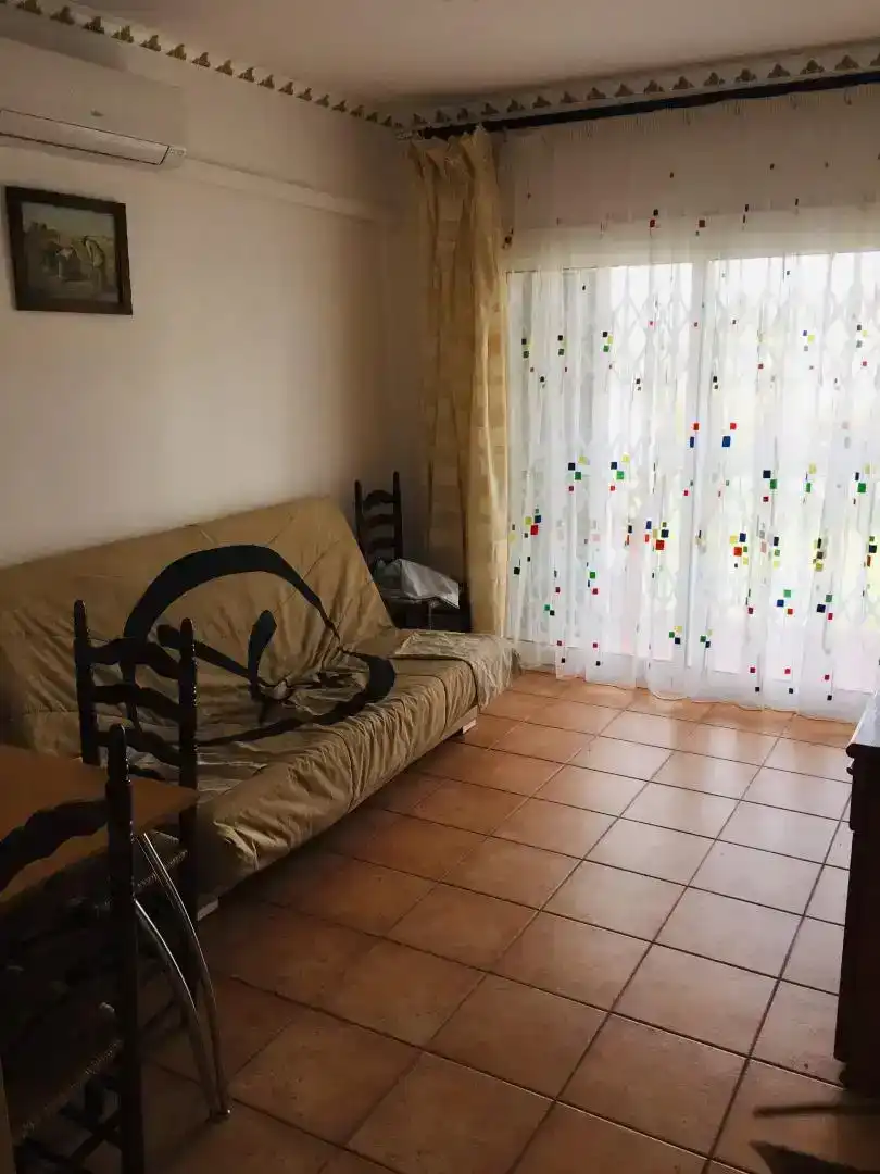 Living room of Flat for sale in L'Escala  with Air Conditioner and Balcony