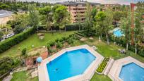 Swimming pool of Duplex for sale in  Madrid Capital  with Air Conditioner and Terrace