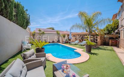 Exterior view of Single-family semi-detached for sale in Mutxamel  with Air Conditioner and Swimming Pool