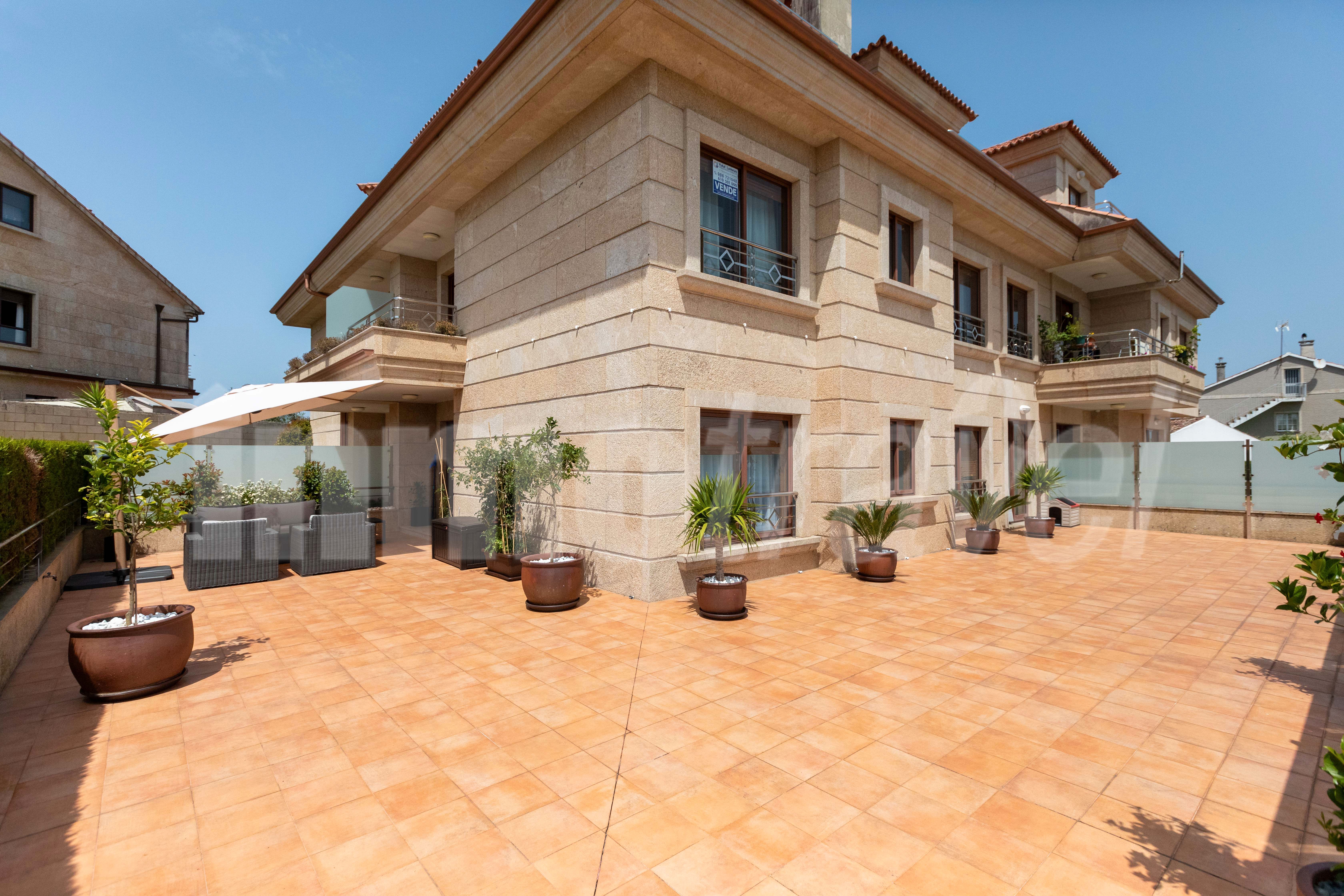 Vista exterior de Planta baixa en venda en Sanxenxo amb Calefacció, Jardí privat i Terrassa