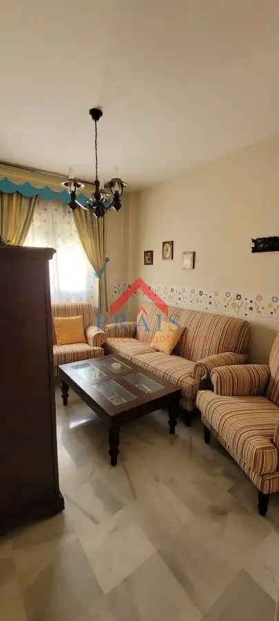 Sala de estar de Casa adosada en venta en Utrera con Aire acondicionado, Trastero y Amueblado