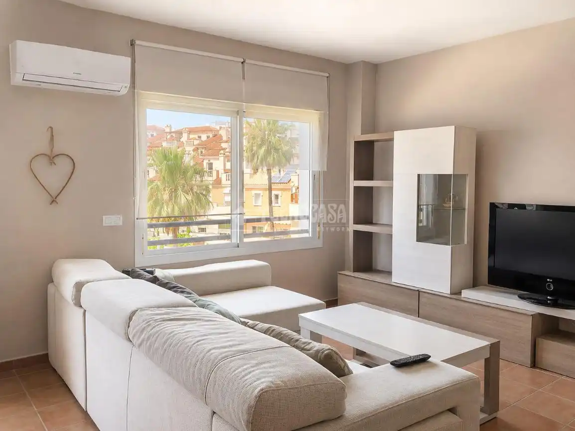 Sala de estar de Casa adosada en venta en Rincón de la Victoria