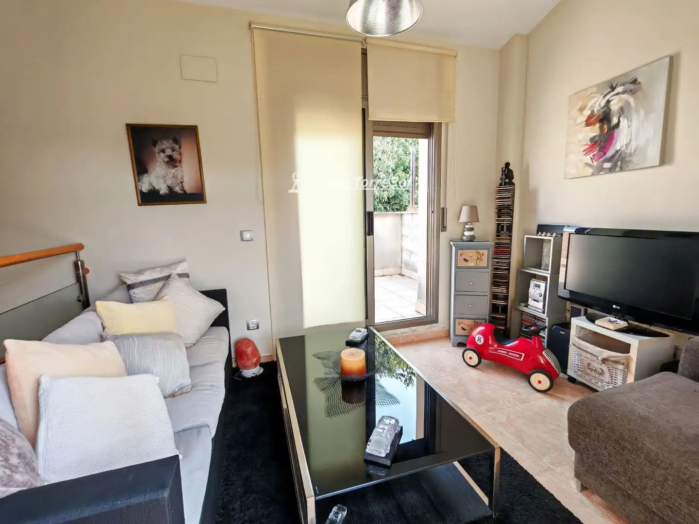 Sala d'estar de Casa adosada en venda en El Vendrell amb Aire condicionat, Calefacció i Jardí privat