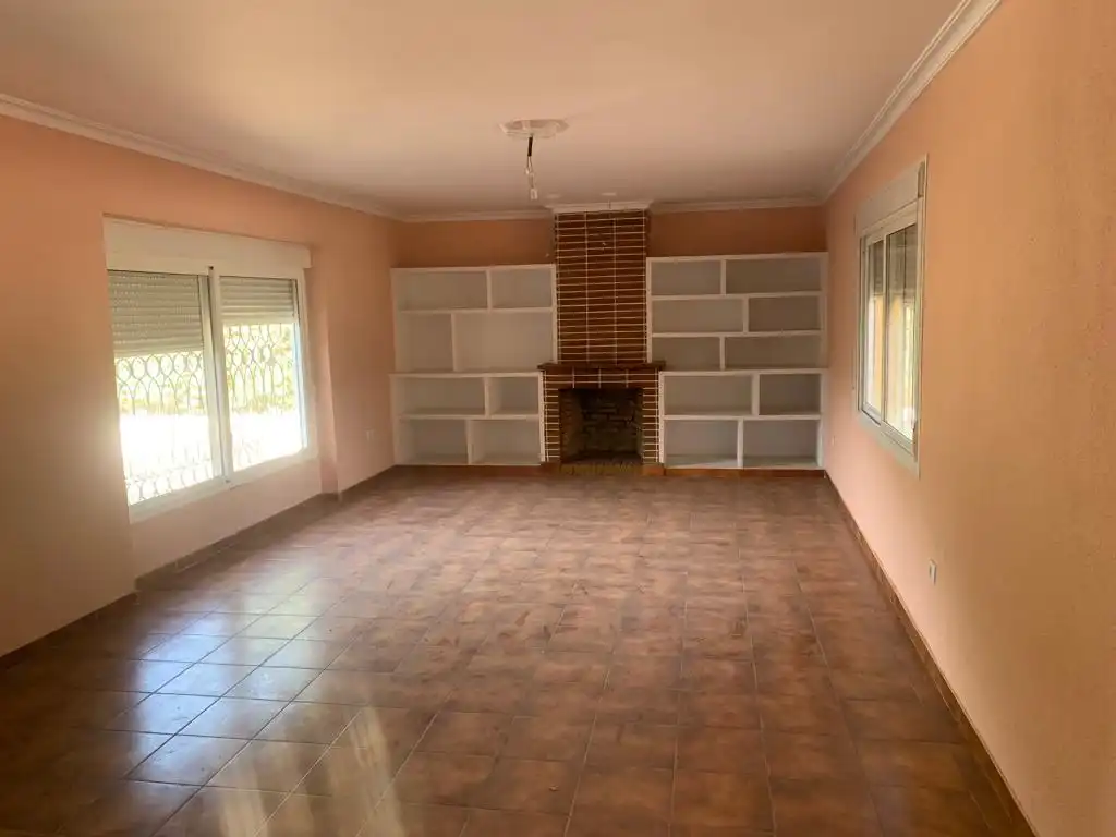 Sala d'estar de Casa o xalet de lloguer en Dos Hermanas amb Jardí privat, Piscina i Es permeten mascotes