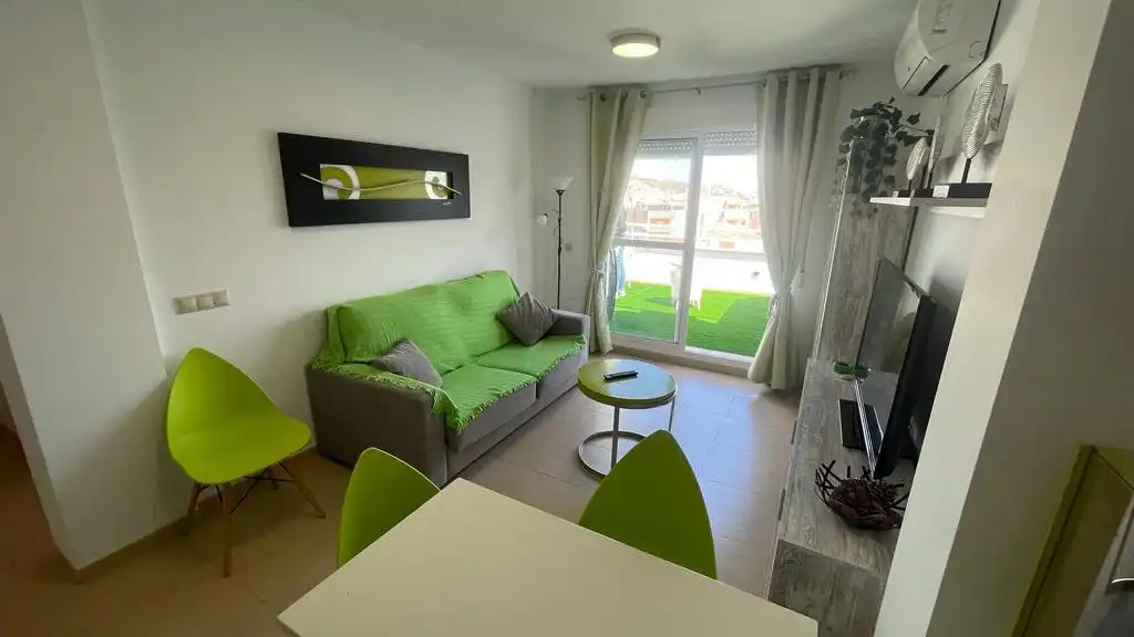 Wohnzimmer von Dachboden zum Verkauf in Pulpí mit Klimaanlage, Heizung und Privatgarten