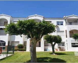 Exterior view of Flat for sale in Roquetas de Mar  with Private garden and Swimming Pool