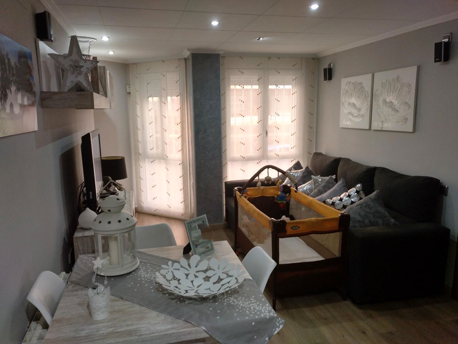 Living room of Planta baja for sale in Mataró  with Heating and Oven