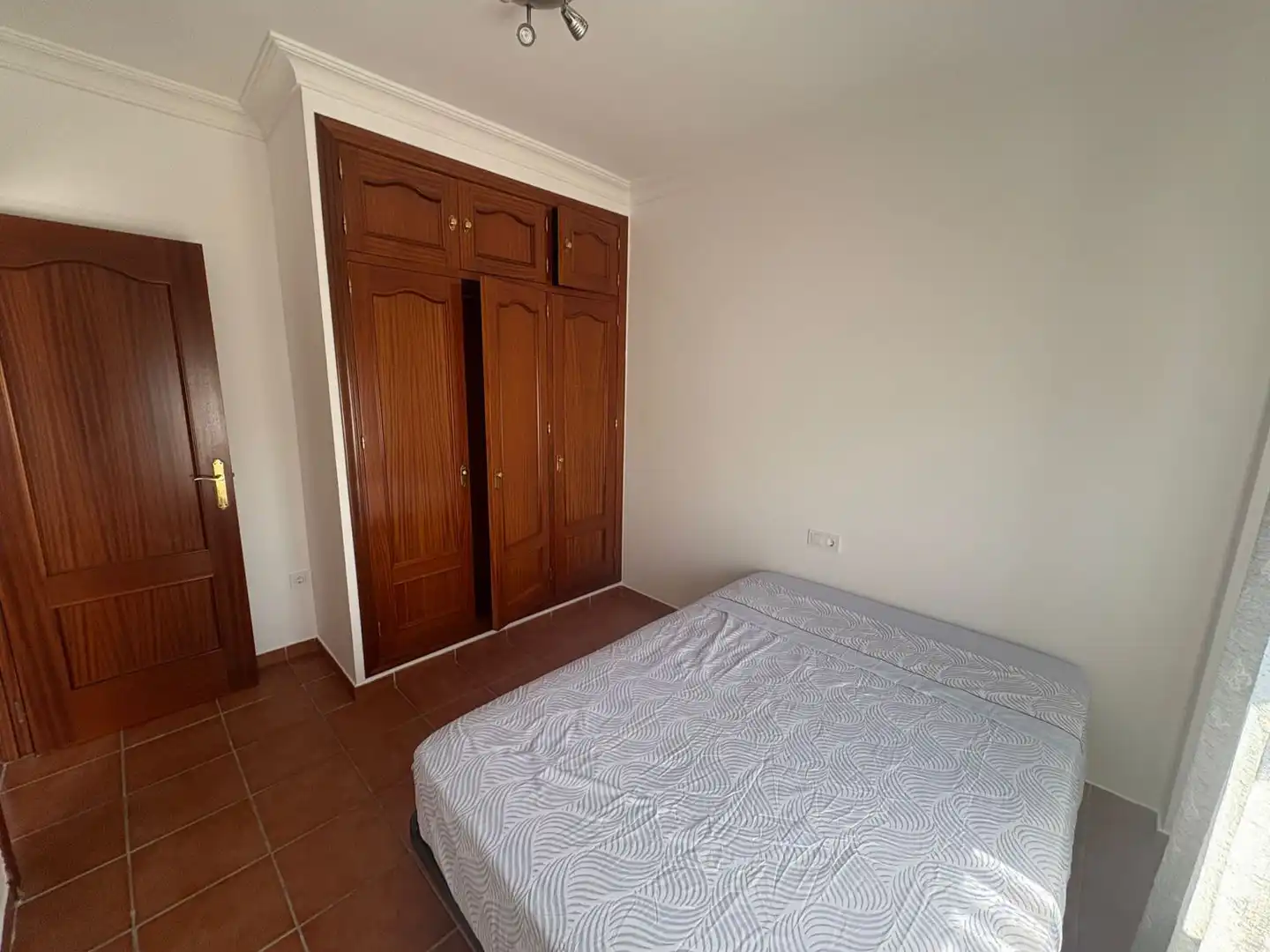 Dormitori de Casa o xalet de lloguer en Aljaraque amb Terrassa i Moblat