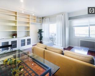 Living room of Flat to rent in  Madrid Capital  with Air Conditioner and Balcony