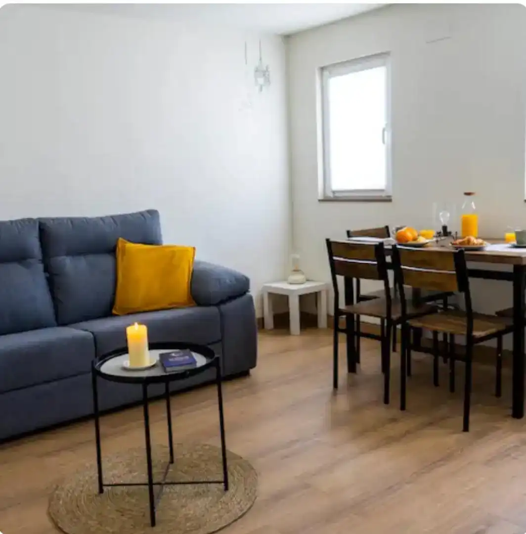 Sala de estar de Casa adosada en venta en Málaga con Aire acondicionado, Parquet y Amueblado