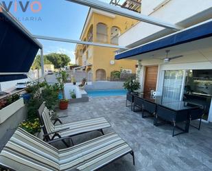 Exterior view of Single-family semi-detached for sale in Águilas  with Air Conditioner, Terrace and Swimming Pool