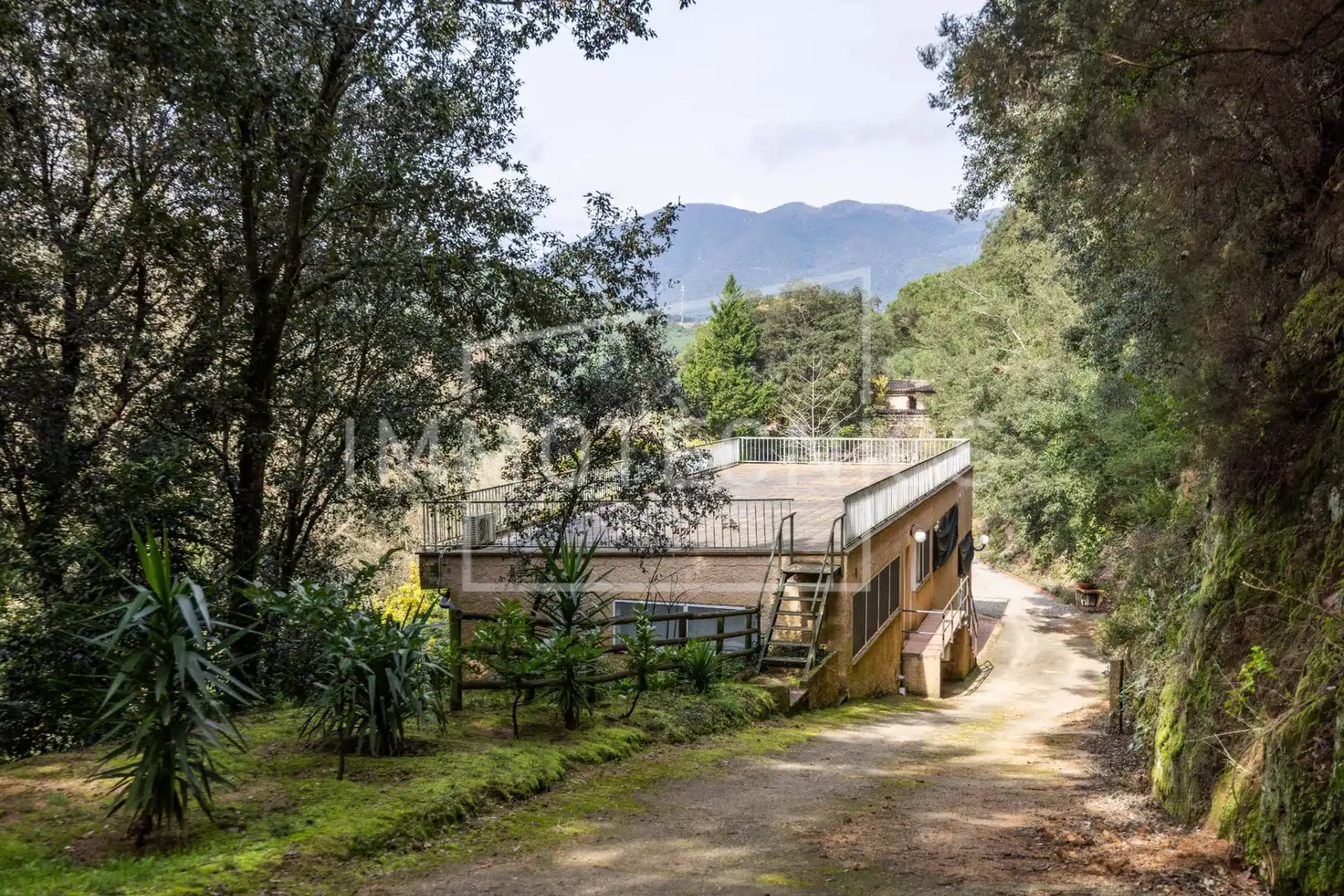 Vista exterior de Finca rústica en venda en Sant Iscle de Vallalta amb Calefacció, Jardí privat i Piscina