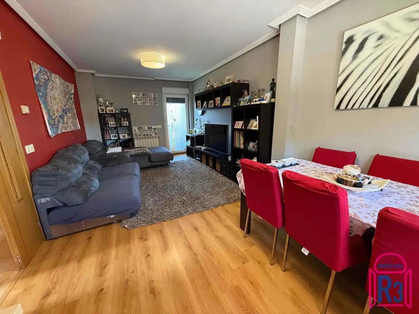 Sala de estar de Casa adosada en venta en Onzonilla con Calefacción