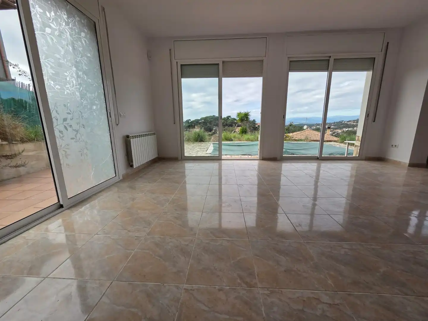 Sala d'estar de Casa o xalet en venda en Lloret de Mar amb Calefacció, Jardí privat i Terrassa