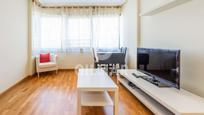 Living room of Flat for sale in  Madrid Capital  with Air Conditioner, Heating and Community pool