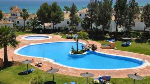 EXCEPCIONAL BAJO CON GRAN TERRAZA Y SEGURIDAD 24H EN DUQUESA SUITES, MANILVA