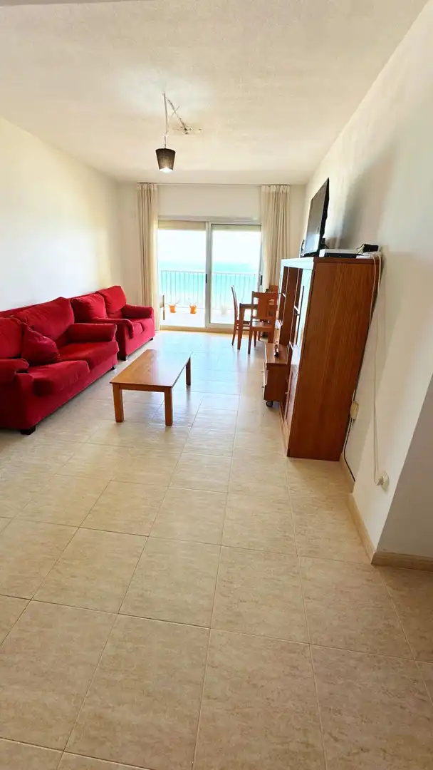 Sala de estar de Apartamento en venta en Gandia con Amueblado, Balcón y Piscina comunitaria