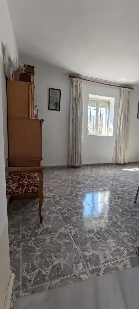 Sala d'estar de Finca rústica en venda en Comares amb Aire condicionat i Piscina