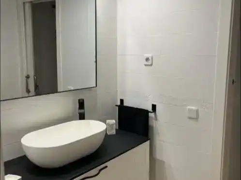 Bany de Apartament de lloguer en Oliva amb Aire condicionat, Piscina i Moblat