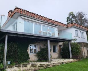 Vista exterior de Casa o xalet en venda en Vigo  amb Jardí privat, Parquet i Terrassa