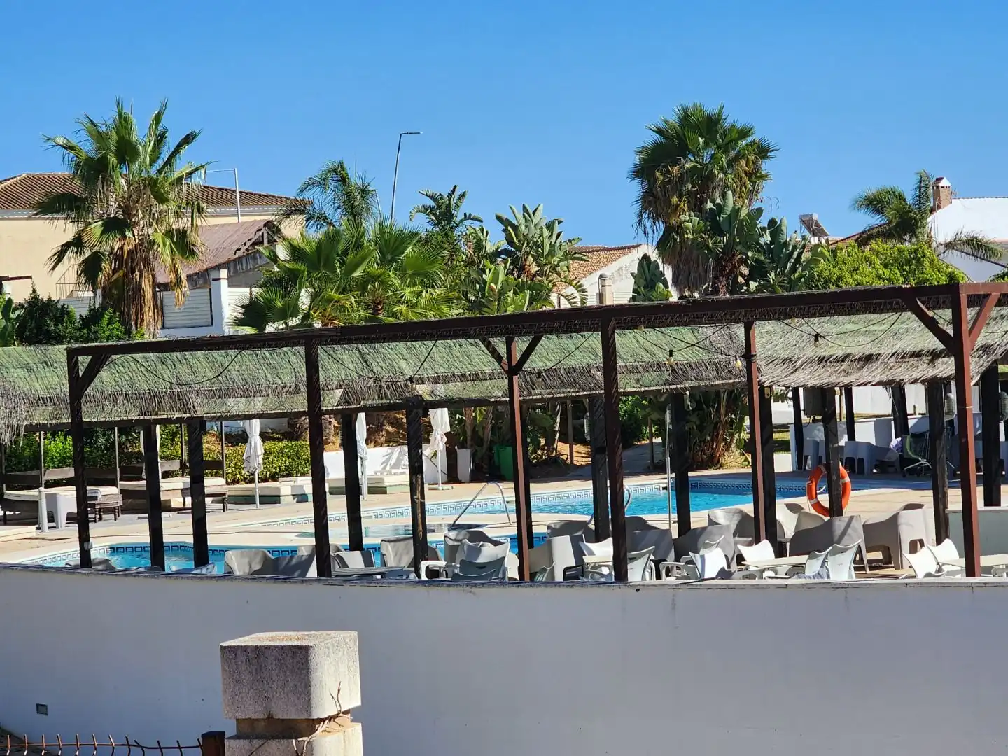 Schwimmbecken von Wohnung zur Miete in Aljaraque mit Balkon