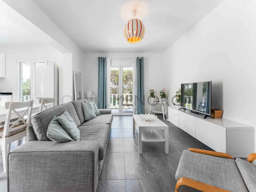 Sala d'estar de Casa o xalet en venda en Ciutadella de Menorca amb Aire condicionat, Jardí privat i Terrassa