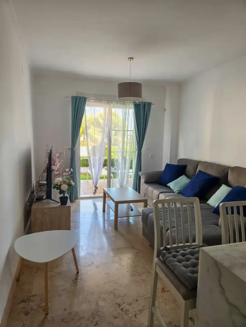 Sala de estar de Planta baja en venta en Manilva con Aire acondicionado, Terraza y Piscina