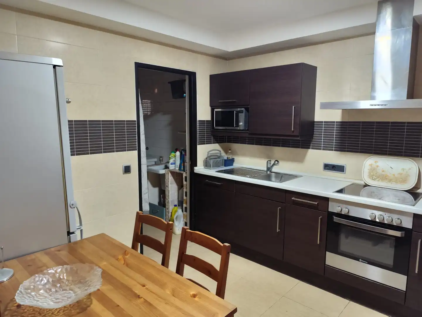 Küche von Wohnung zum Verkauf in Capdepera mit Klimaanlage, Privatgarten und Terrasse