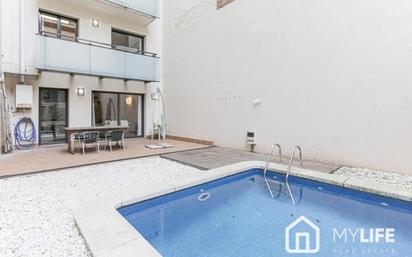 Swimming pool of Duplex for sale in  Barcelona Capital  with Air Conditioner, Heating and Terrace