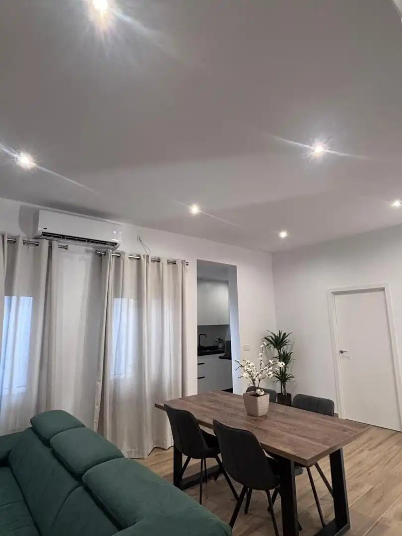 Living room of Flat for rent in Granada  with Air Conditioner, Furnished and Balcony