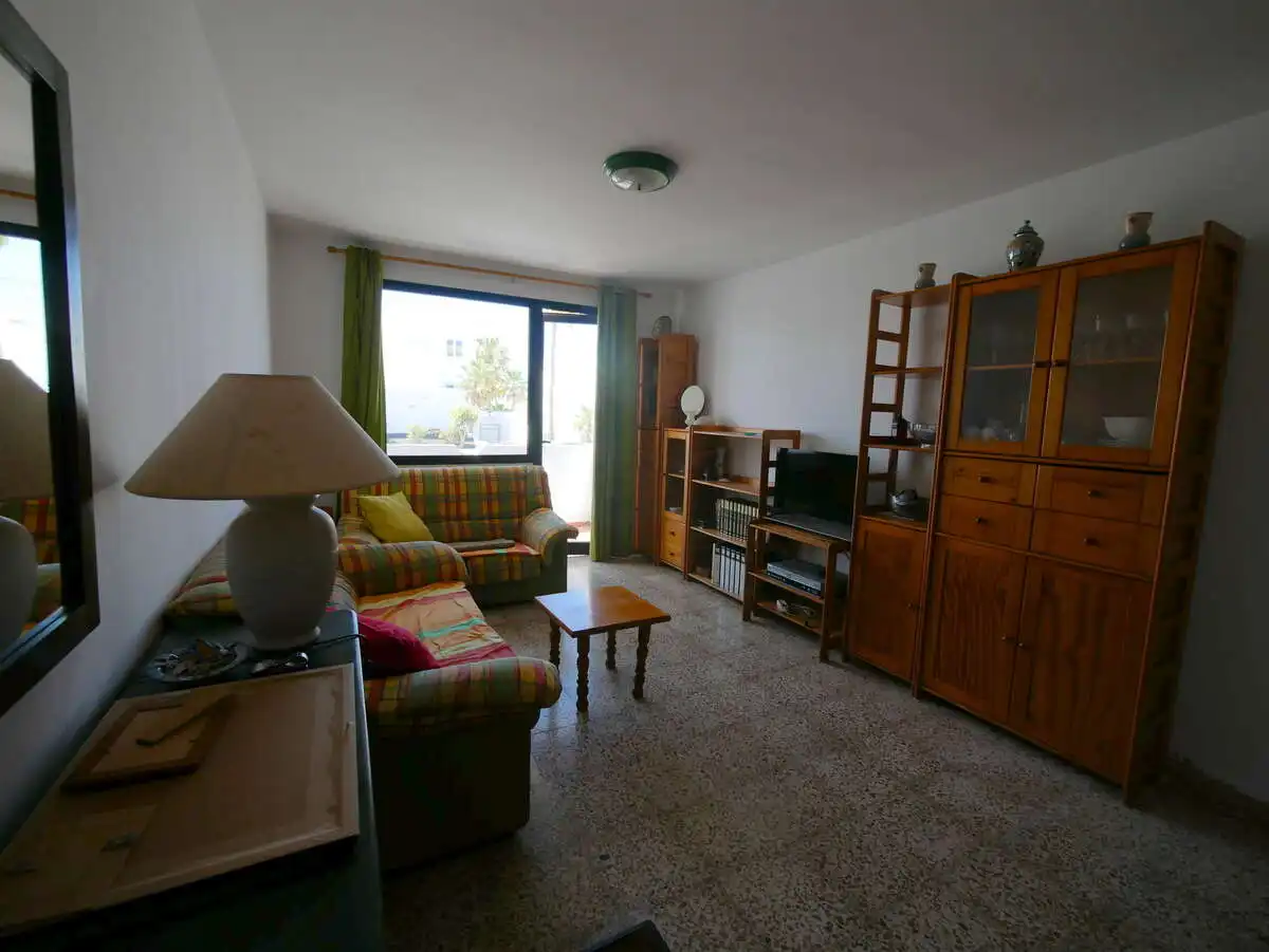 Sala d'estar de Apartament en venda en Tías amb Terrassa i Moblat