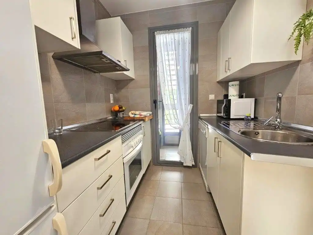 Cocina de Apartamento en venta en Dénia con Aire acondicionado, Terraza y Trastero