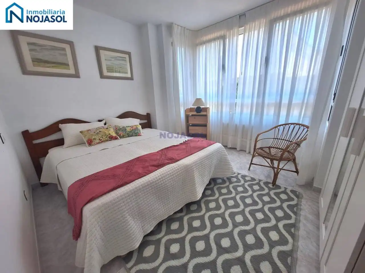 Dormitori de Apartament de lloguer en Noja amb Calefacció, Jardí privat i Terrassa