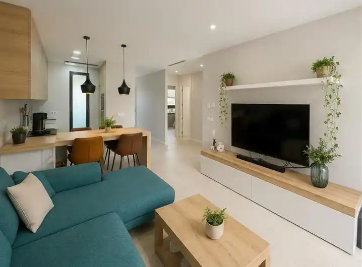 Sala de estar de Casa adosada de alquiler en Finestrat con Aire acondicionado, Jardín privado y Terraza