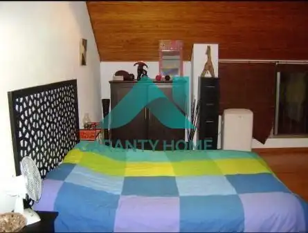 Schlafzimmer von Dachboden zur Miete in Cáceres mit Klimaanlage, Heizung und Terrasse