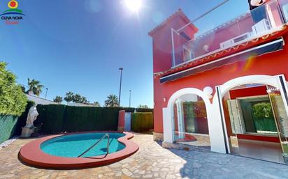 Exterior view of House or chalet for sale in Oliva  with Terrace and Swimming Pool