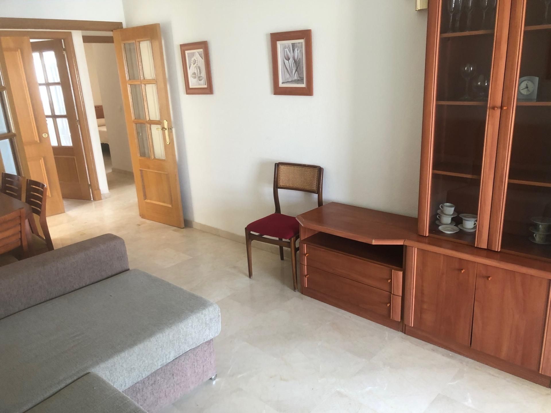 Sala d'estar de Apartament en venda en Benidorm amb Aire condicionat, Jardí privat i Terrassa