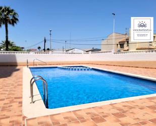 Swimming pool of Apartment for sale in Torrevieja  with Air Conditioner, Heating and Terrace