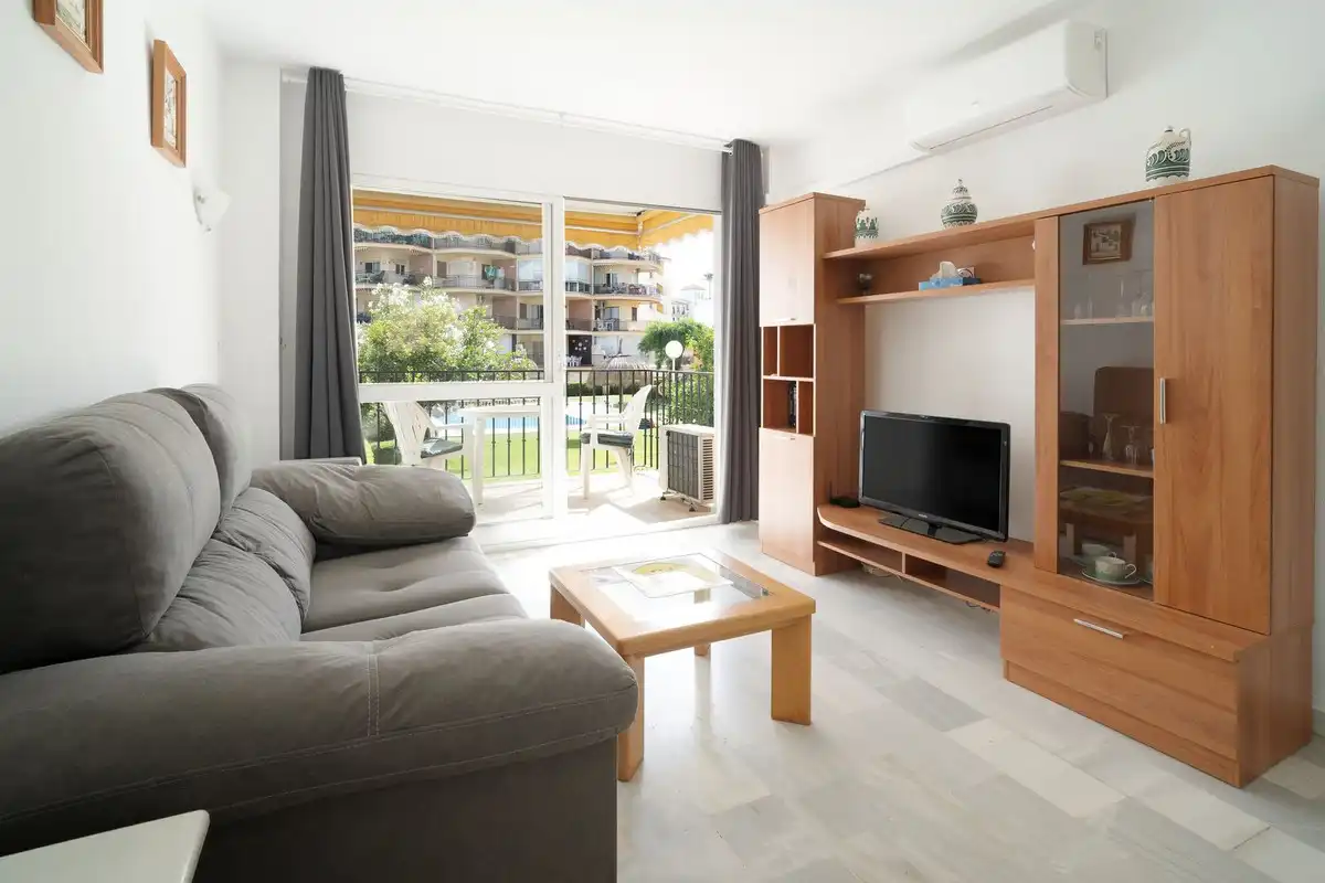Sala d'estar de Apartament en venda en Torremolinos amb Aire condicionat i Piscina comunitària
