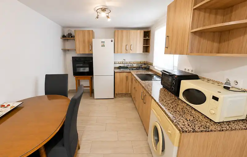 Cuina de Casa o xalet en venda en Vélez-Málaga amb Aire condicionat, Terrassa i Moblat
