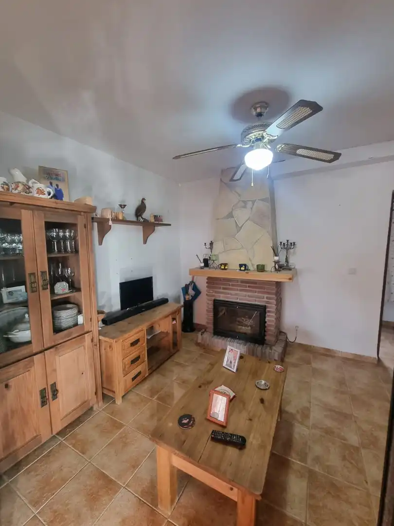 Sala de estar de Casa o chalet en venta en Nerja con Calefacción, Jardín privado y Terraza